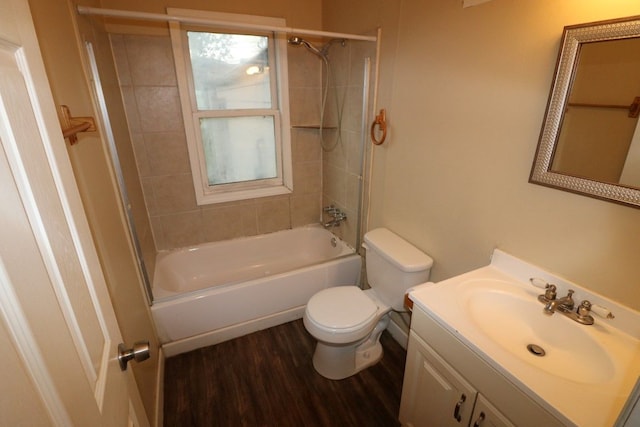 27116 Seyburn Ave, Warren, MI 48092 - bathroom featuring wood finished floors, toilet, shower / washtub combination, and vanity