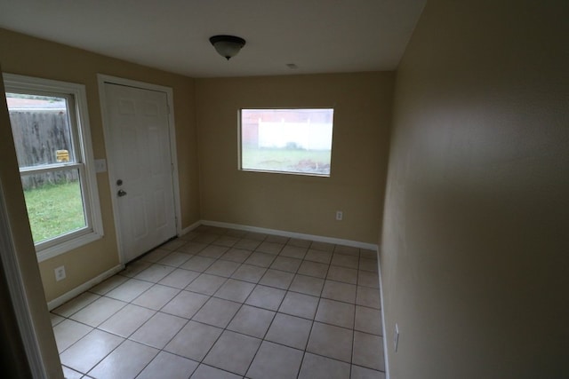 27116 Seyburn Ave, Warren, MI 48092 - empty room with light tile patterned floors and baseboards