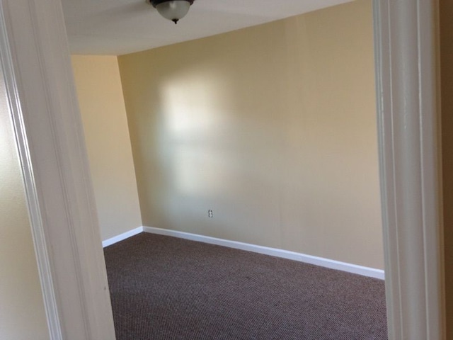 27116 Seyburn Ave, Warren, MI 48092 - unfurnished room featuring dark carpet and baseboards