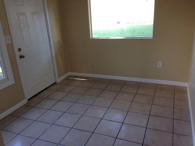 27116 Seyburn Ave, Warren, MI 48092 - unfurnished room featuring light tile patterned floors and baseboards