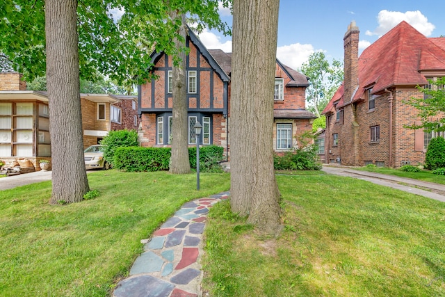 tudor house with a front lawn