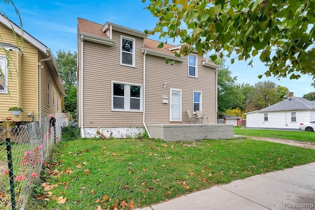 view of front of home with a front yard