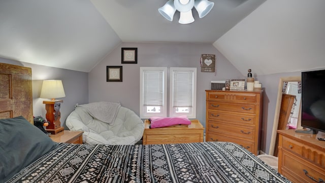 bedroom with ceiling fan and lofted ceiling