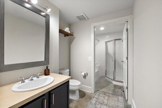 bathroom with vanity, toilet, and walk in shower