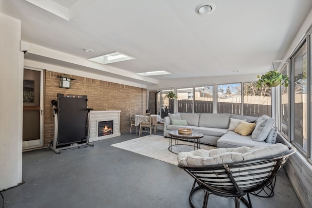 sunroom featuring a skylight