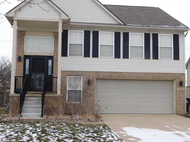 view of front of home with a garage