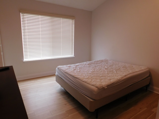 bedroom featuring light hardwood / wood-style floors