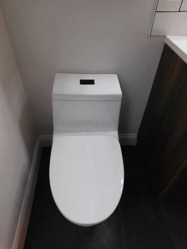 bathroom with tile patterned flooring and vanity