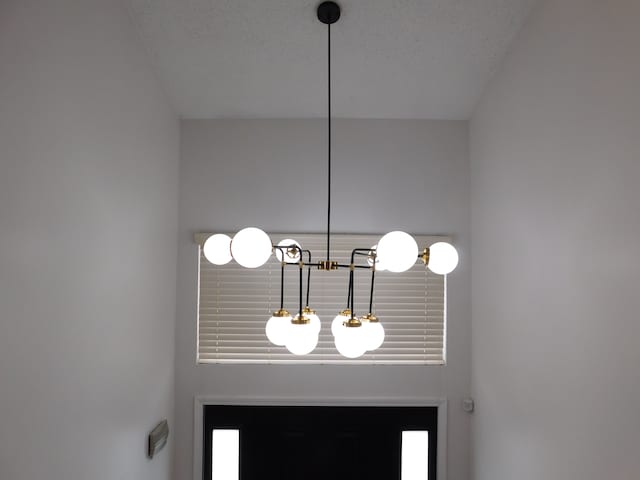 details with a textured ceiling