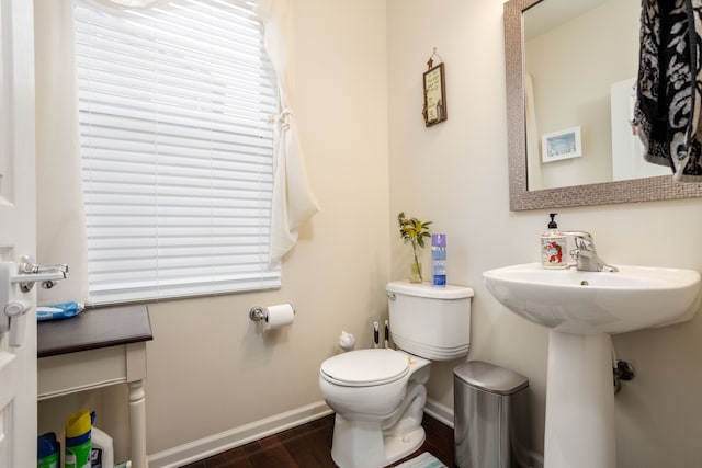 bathroom featuring toilet and hardwood / wood-style floors