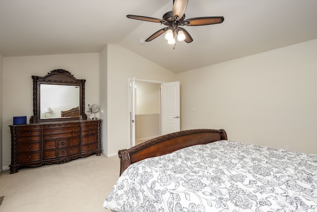 carpeted bedroom featuring lofted ceiling and ceiling fan