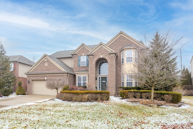 front of property with a garage