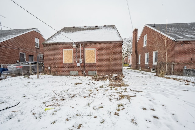 view of snow covered property