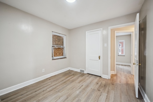 unfurnished bedroom with light hardwood / wood-style flooring