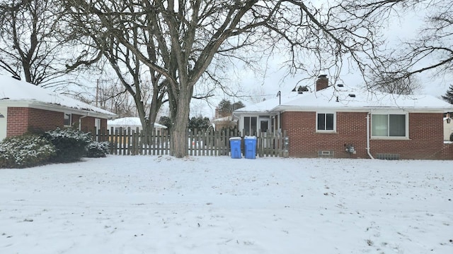 view of yard covered in snow