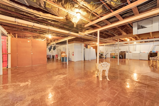 basement featuring independent washer and dryer