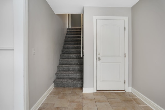31265 Woodside Dr, Franklin, MI 48025 - staircase featuring baseboards