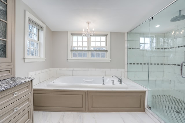 31265 Woodside Dr, Franklin, MI 48025 - bathroom with a chandelier, a shower stall, a garden tub, and vanity