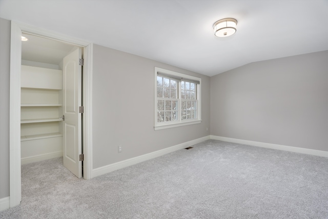 31265 Woodside Dr, Franklin, MI 48025 - unfurnished bedroom with carpet floors, baseboards, and a spacious closet