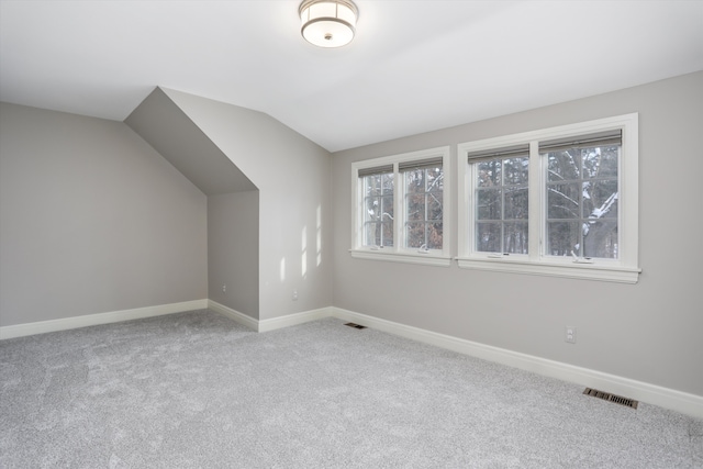 31265 Woodside Dr, Franklin, MI 48025 - bonus room with carpet, vaulted ceiling, and visible vents