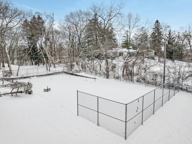 31265 Woodside Dr, Franklin, MI 48025 - snowy yard with fence