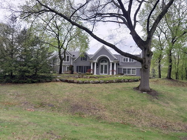 31265 Woodside Dr, Franklin, MI 48025 - view of front of home with french doors and a front yard