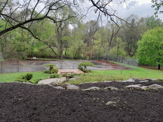 31265 Woodside Dr, Franklin, MI 48025 - view of yard with fence and a wooded view