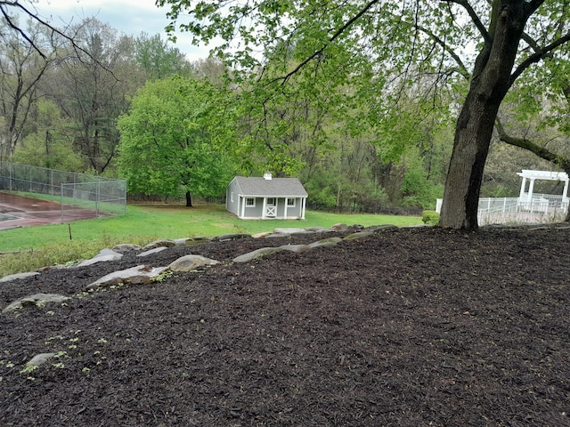 31265 Woodside Dr, Franklin, MI 48025 - view of yard with a view of trees, fence, and an outdoor structure