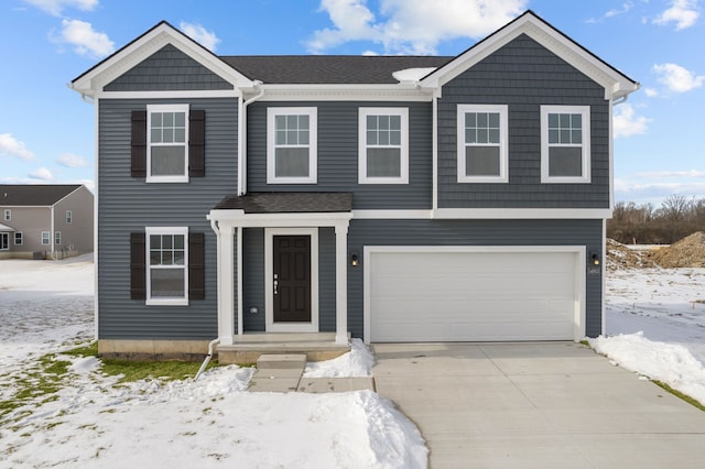 view of front of property featuring a garage