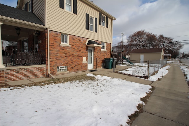 view of snow covered property