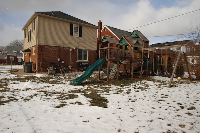 view of snow covered playground