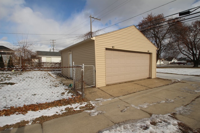 view of snow covered garage