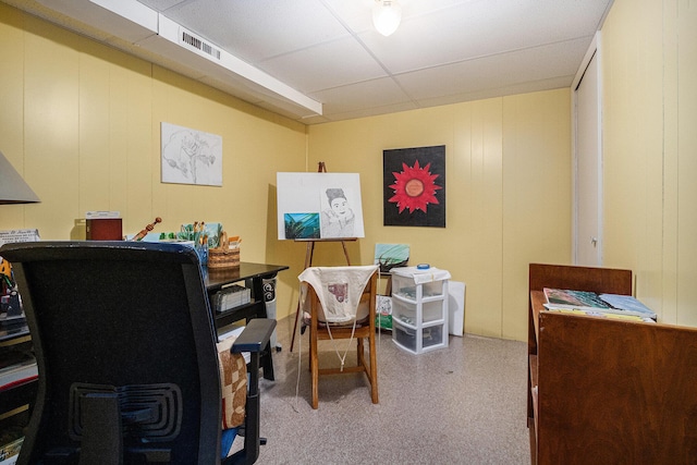 office space with wooden walls