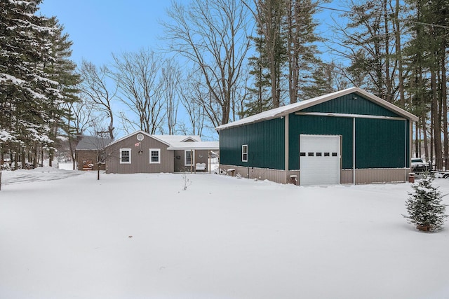 view of snow covered garage