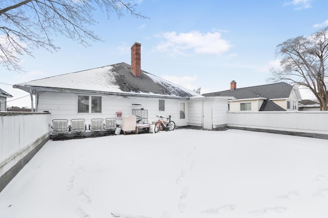 view of snow covered property