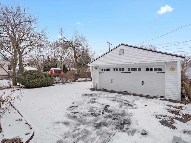 view of snow covered garage