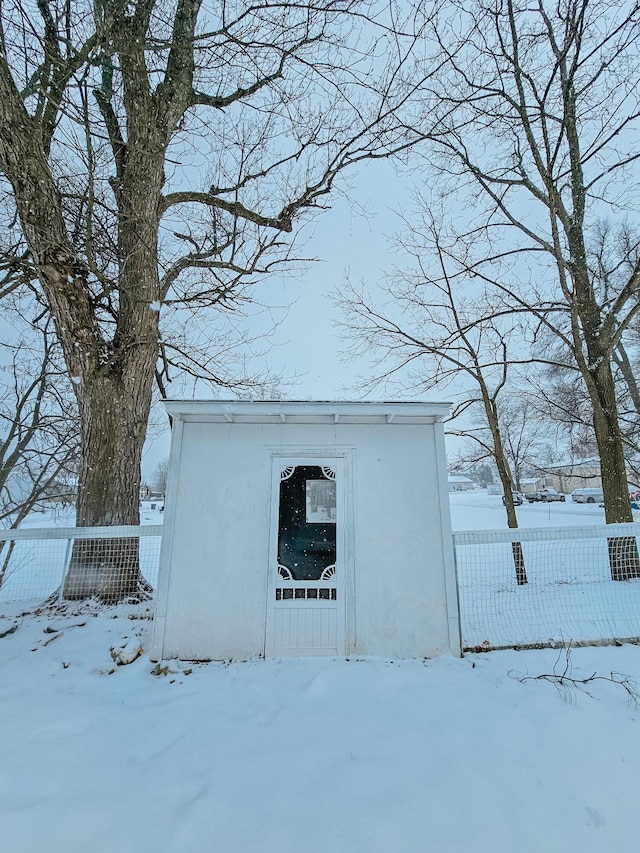 view of snow covered garage