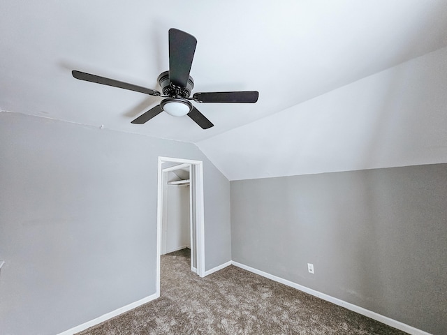 additional living space with lofted ceiling, carpet floors, and ceiling fan