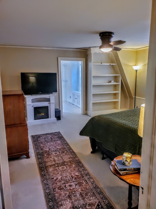 bedroom featuring ceiling fan and carpet floors