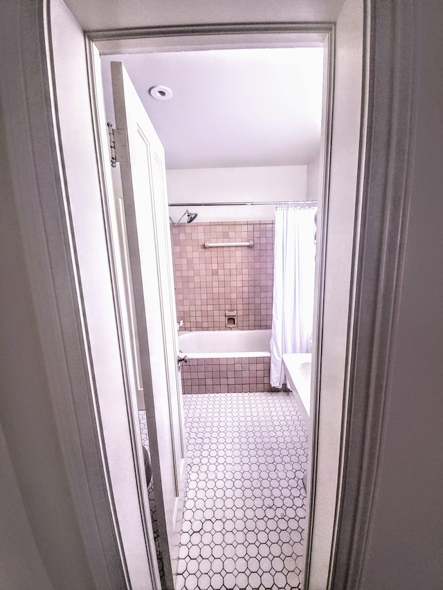 bathroom with tile patterned flooring