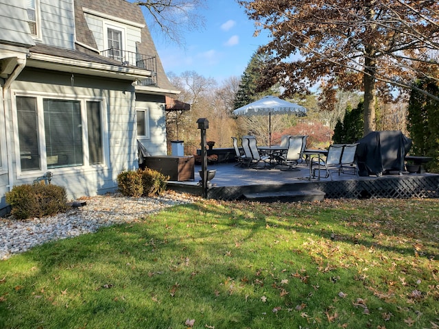 view of yard featuring a deck