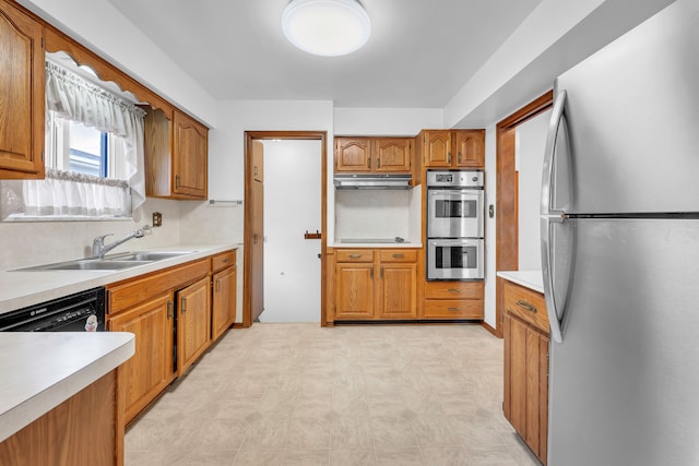 kitchen featuring sink and black appliances