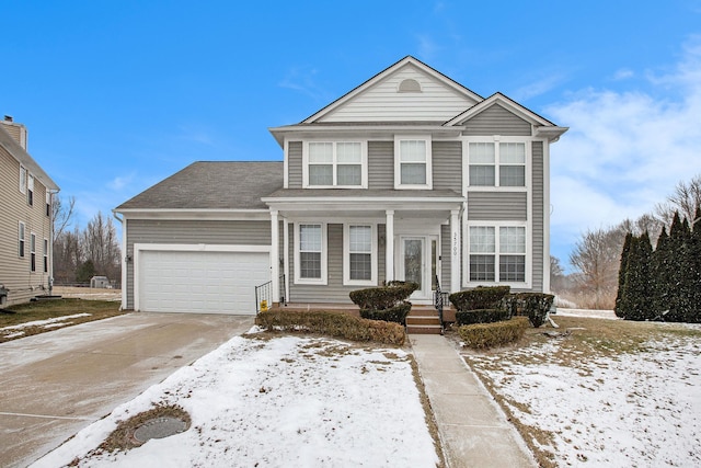 front of property featuring a garage