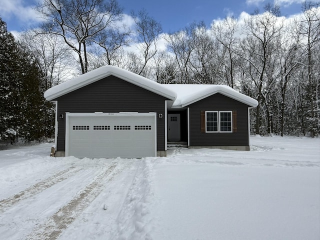 ranch-style home with a garage