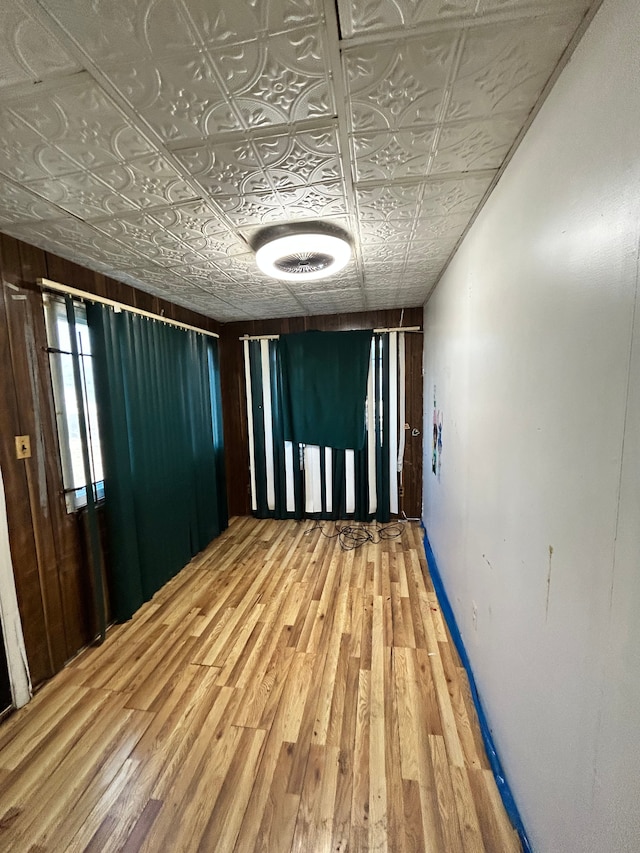 corridor featuring hardwood / wood-style flooring