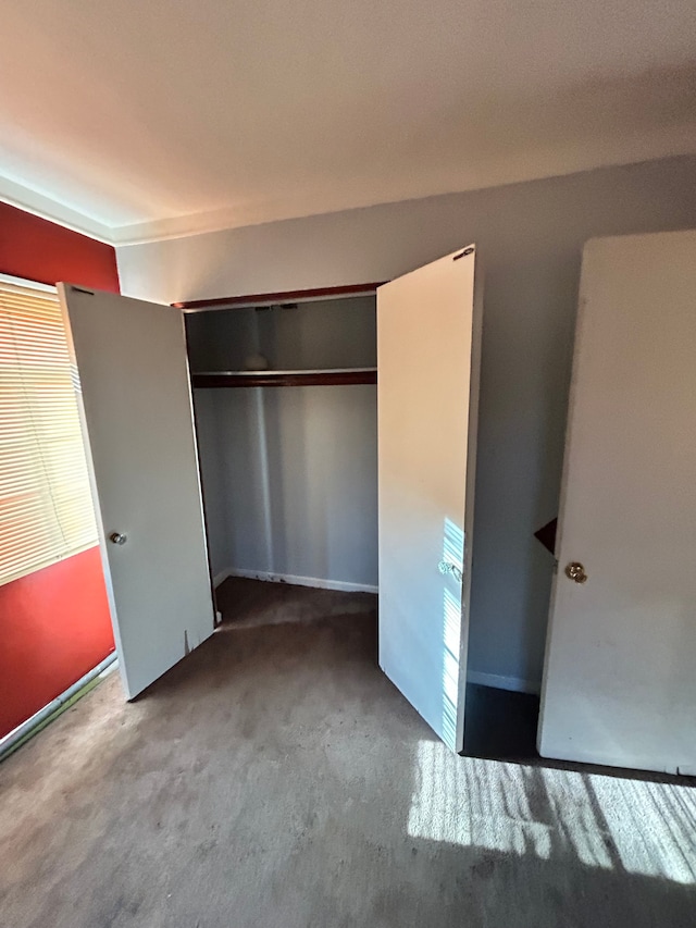 unfurnished bedroom with a closet