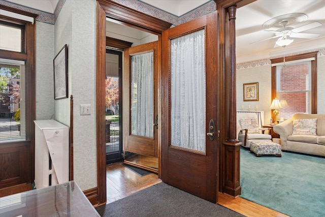 foyer entrance featuring hardwood / wood-style floors and ceiling fan