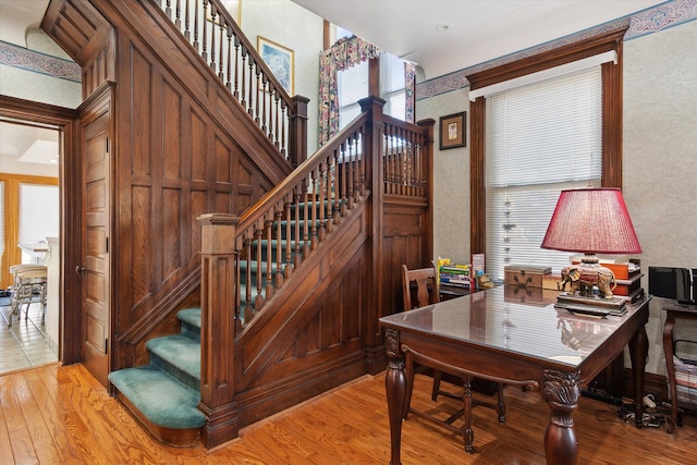 staircase featuring wood-type flooring