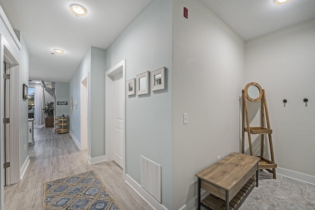 hall featuring light hardwood / wood-style flooring