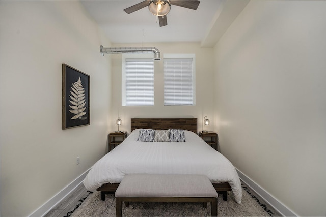 bedroom with hardwood / wood-style flooring and ceiling fan